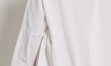 white cotton rigid dress