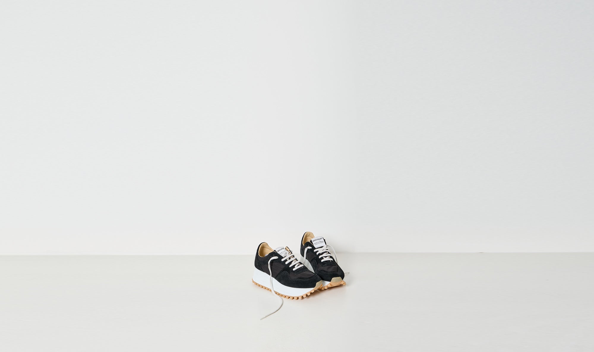 black white sole sneakers