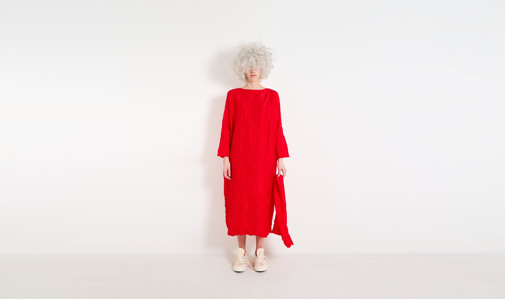 red crumpled silk dress