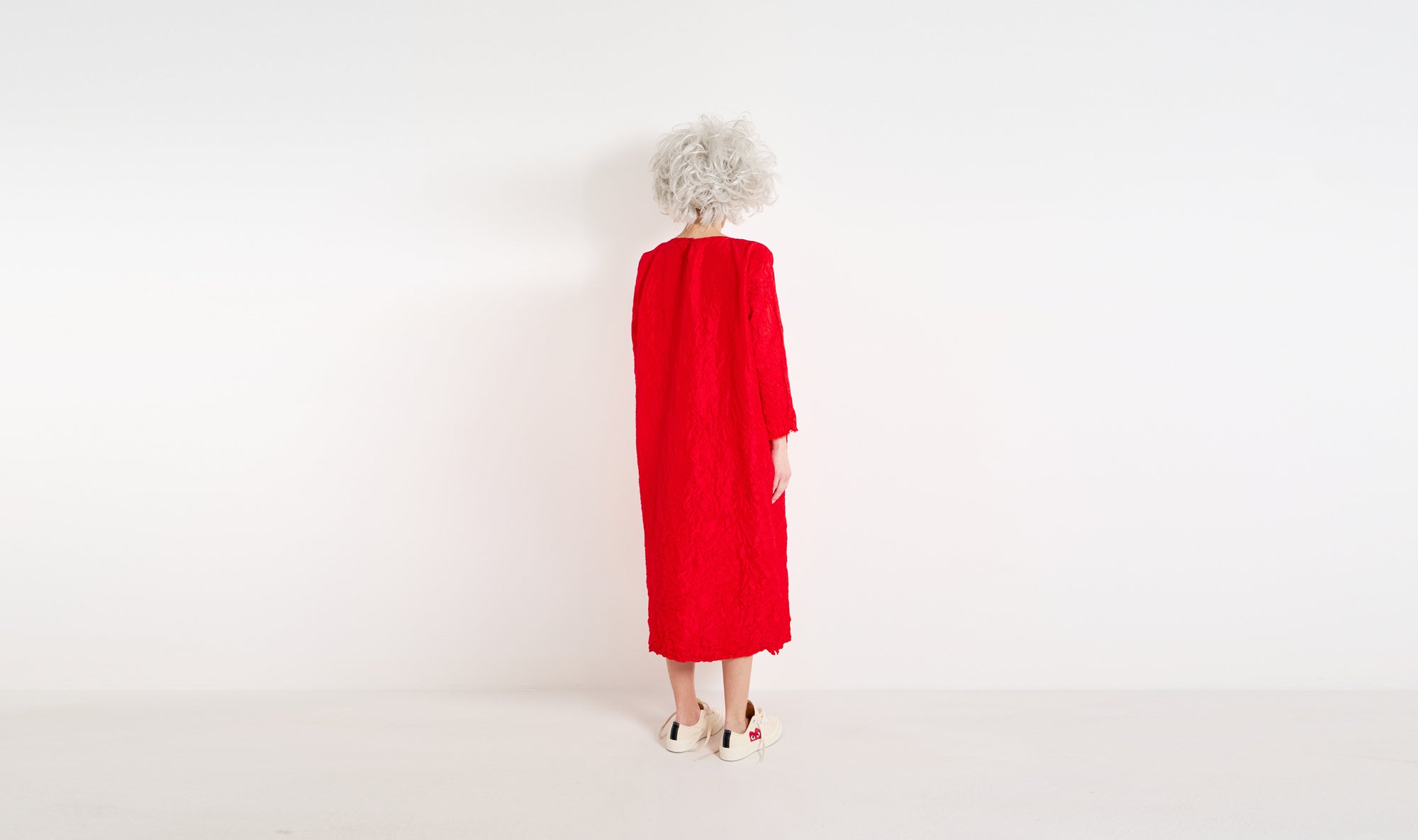 red crumpled silk dress