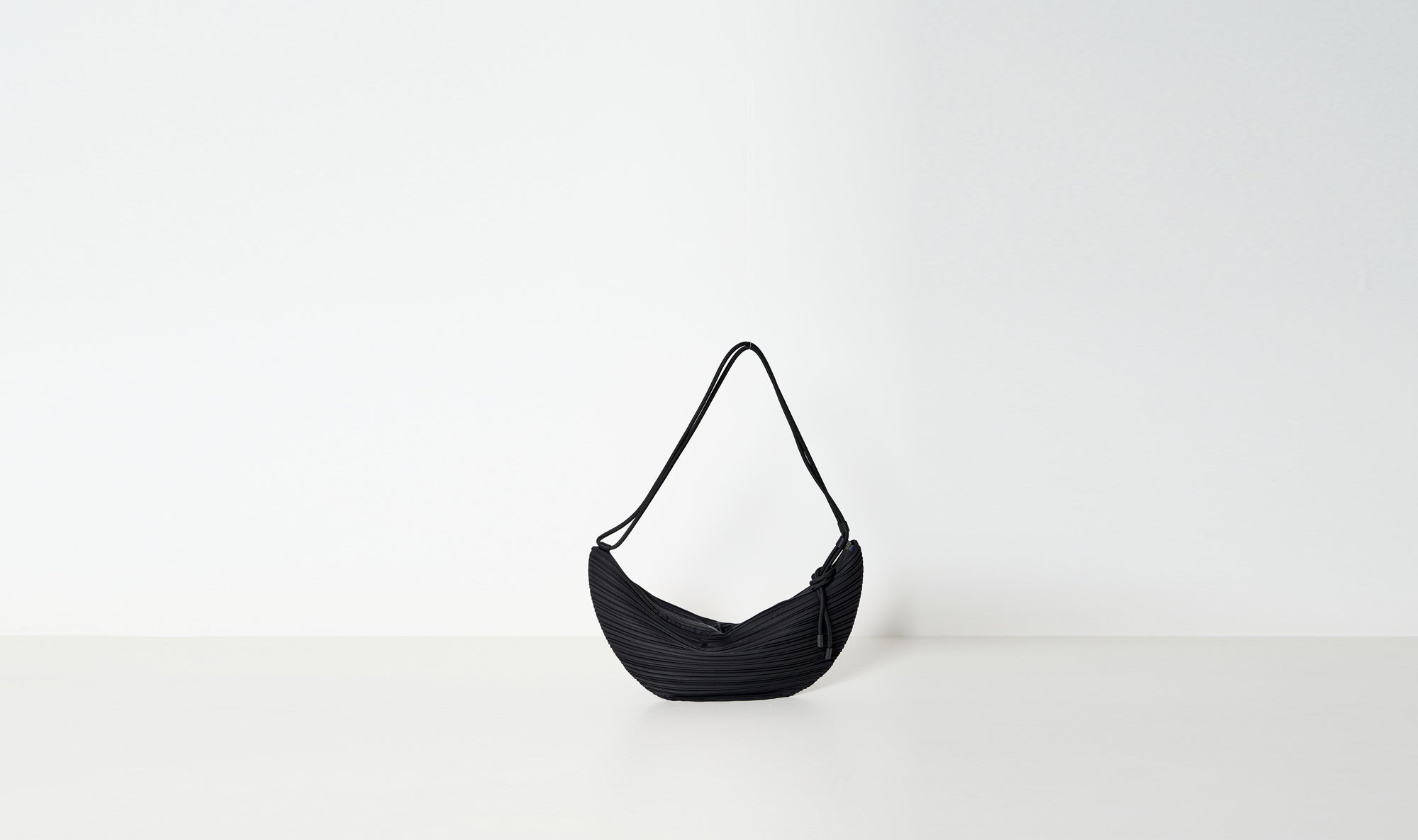 black plissé bag