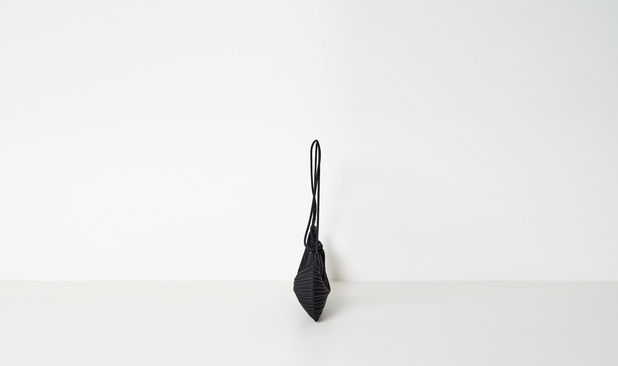 black plissé bag
