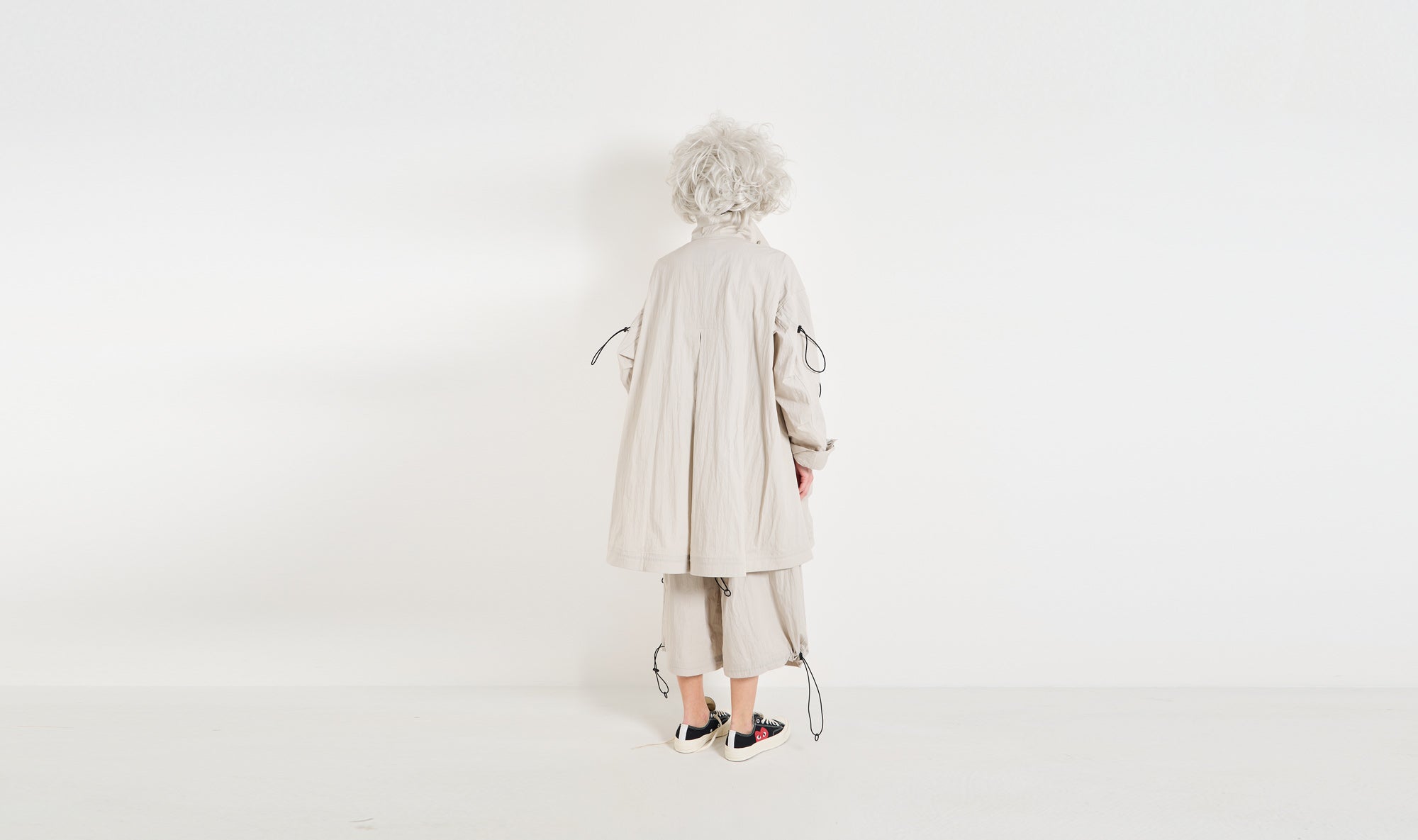 grey nylon overcoat trousers outfit