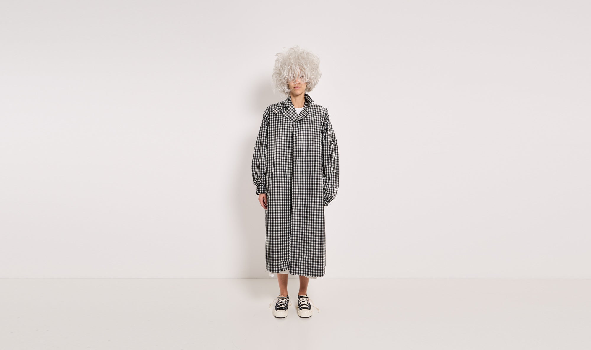 impermeabile check bianco nero