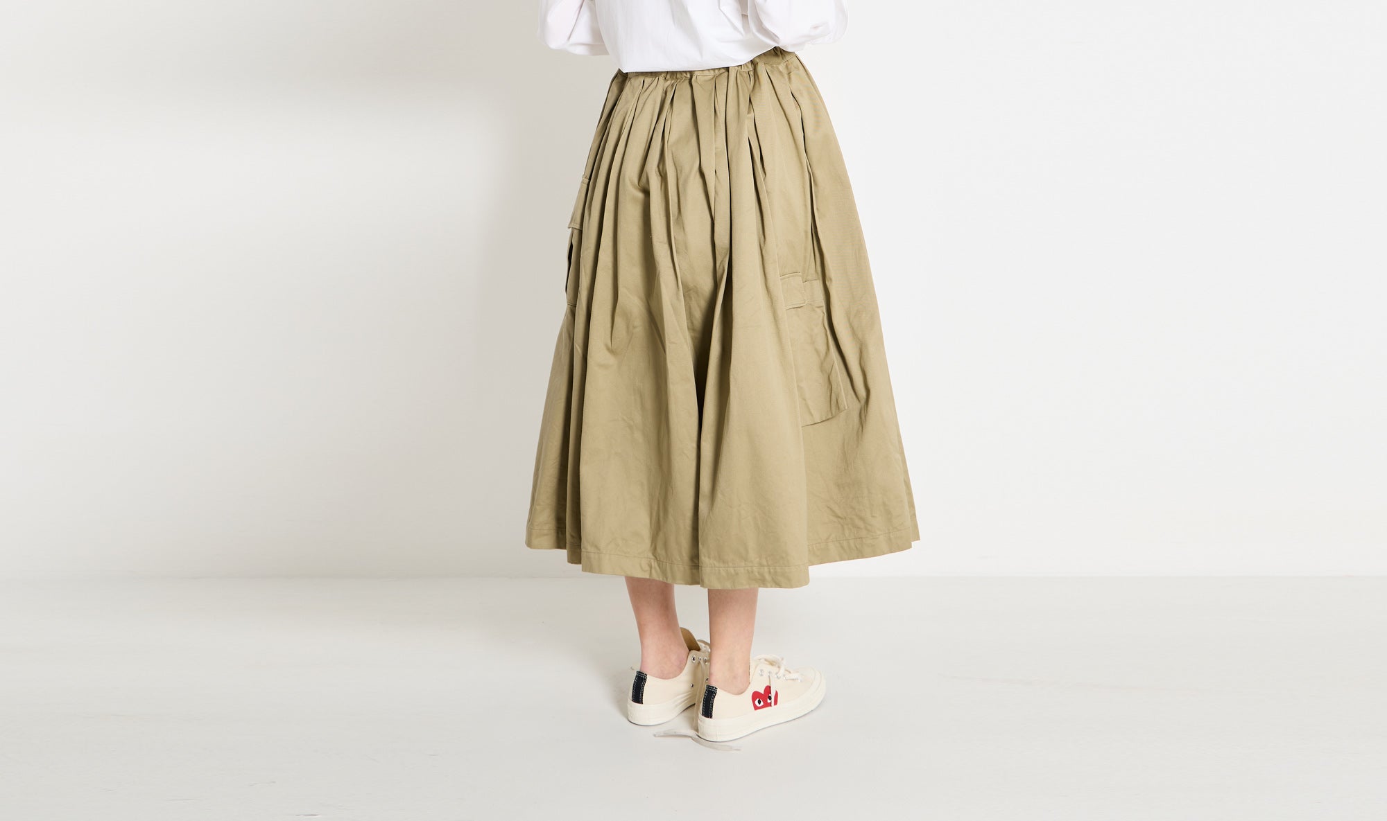 beige patched pockets skirt