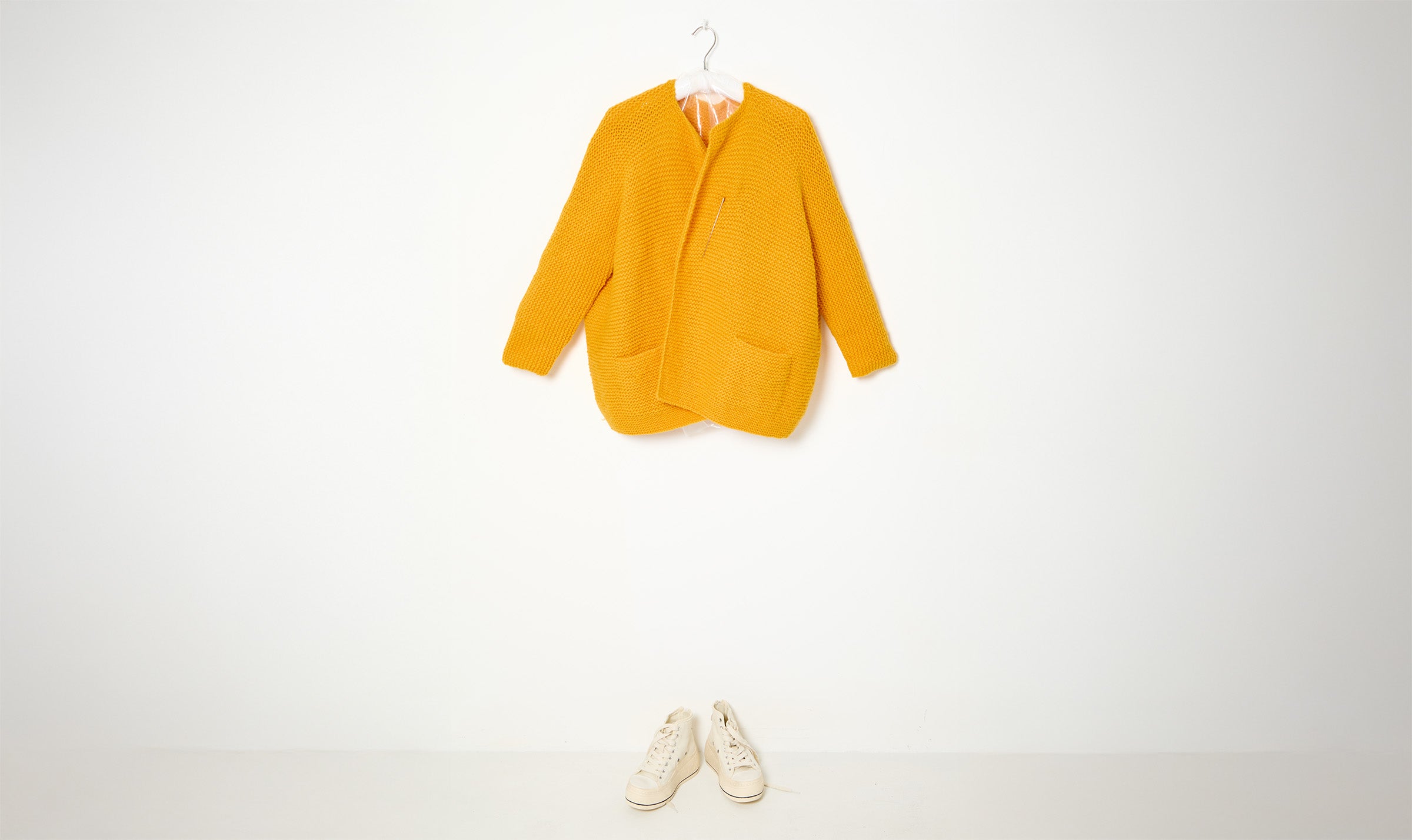 yellow woolen cardigan