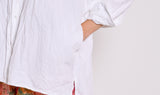 white crumpled cotton shirt