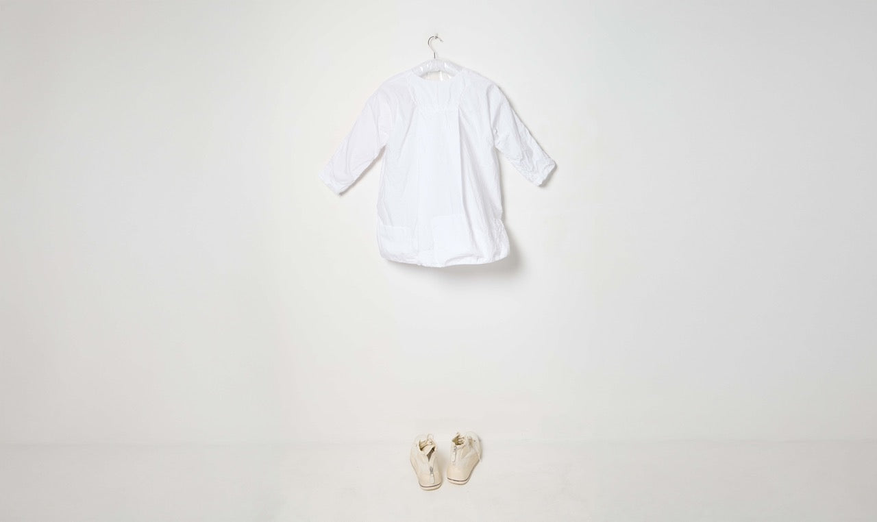 white flared cotton tunic