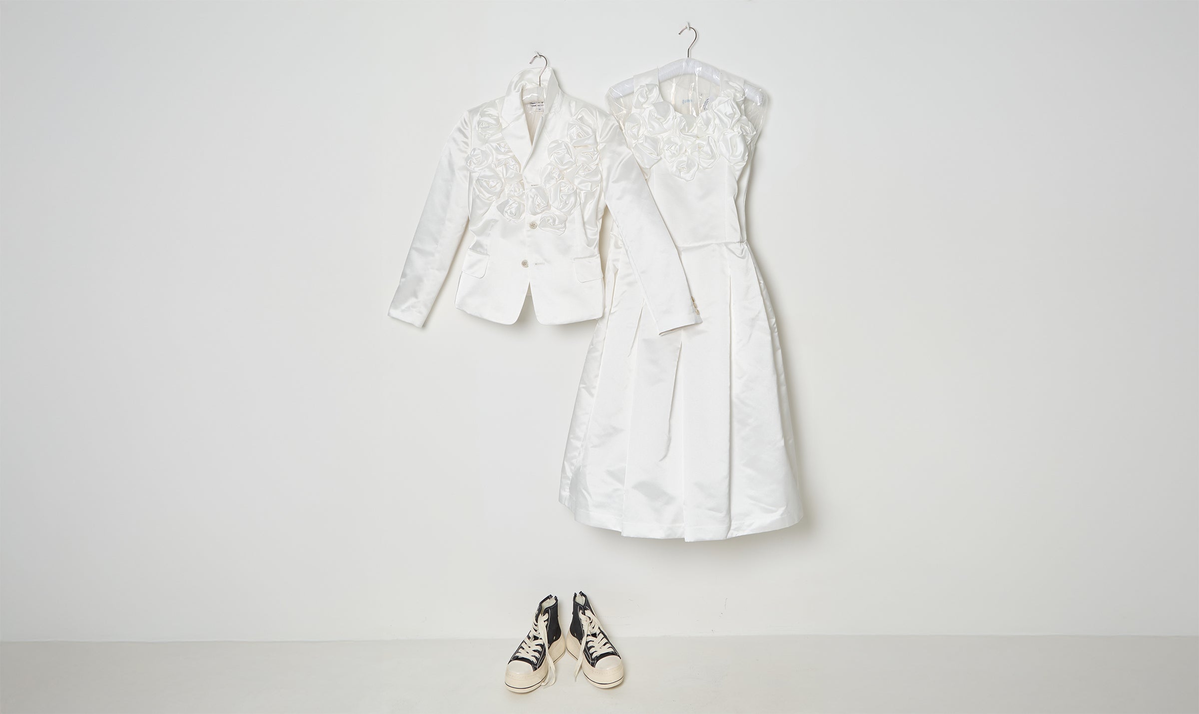 white draped jacket and dress