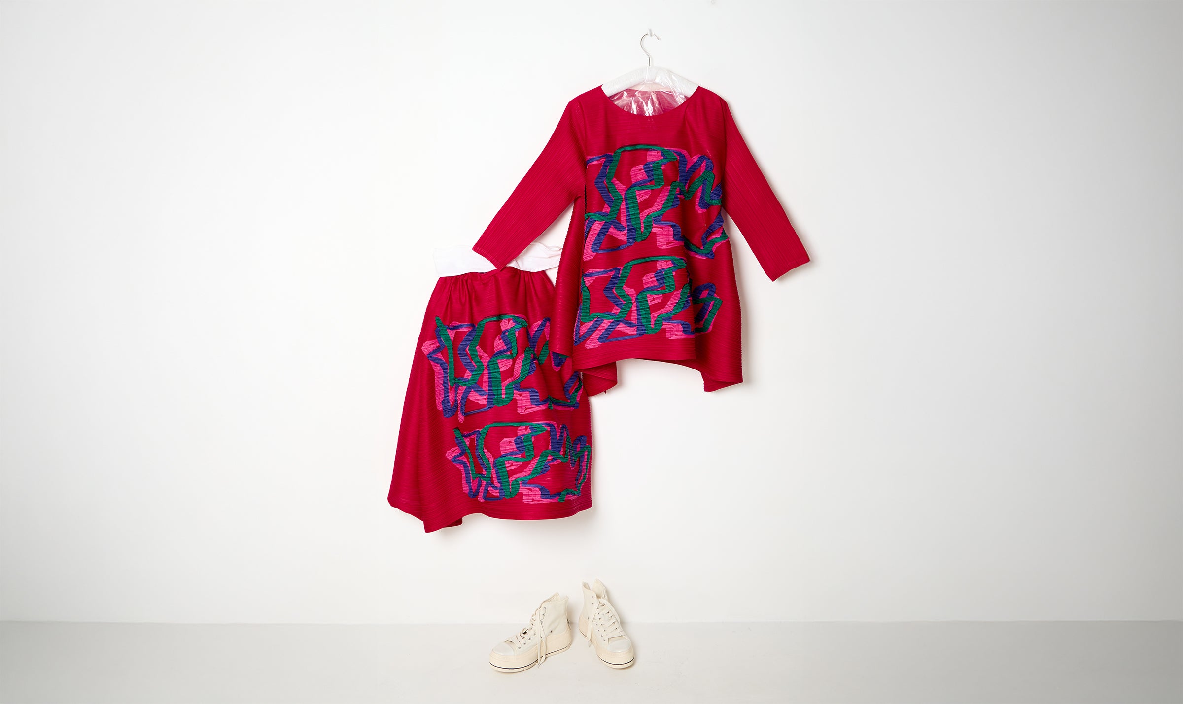 red embroidered pleated look