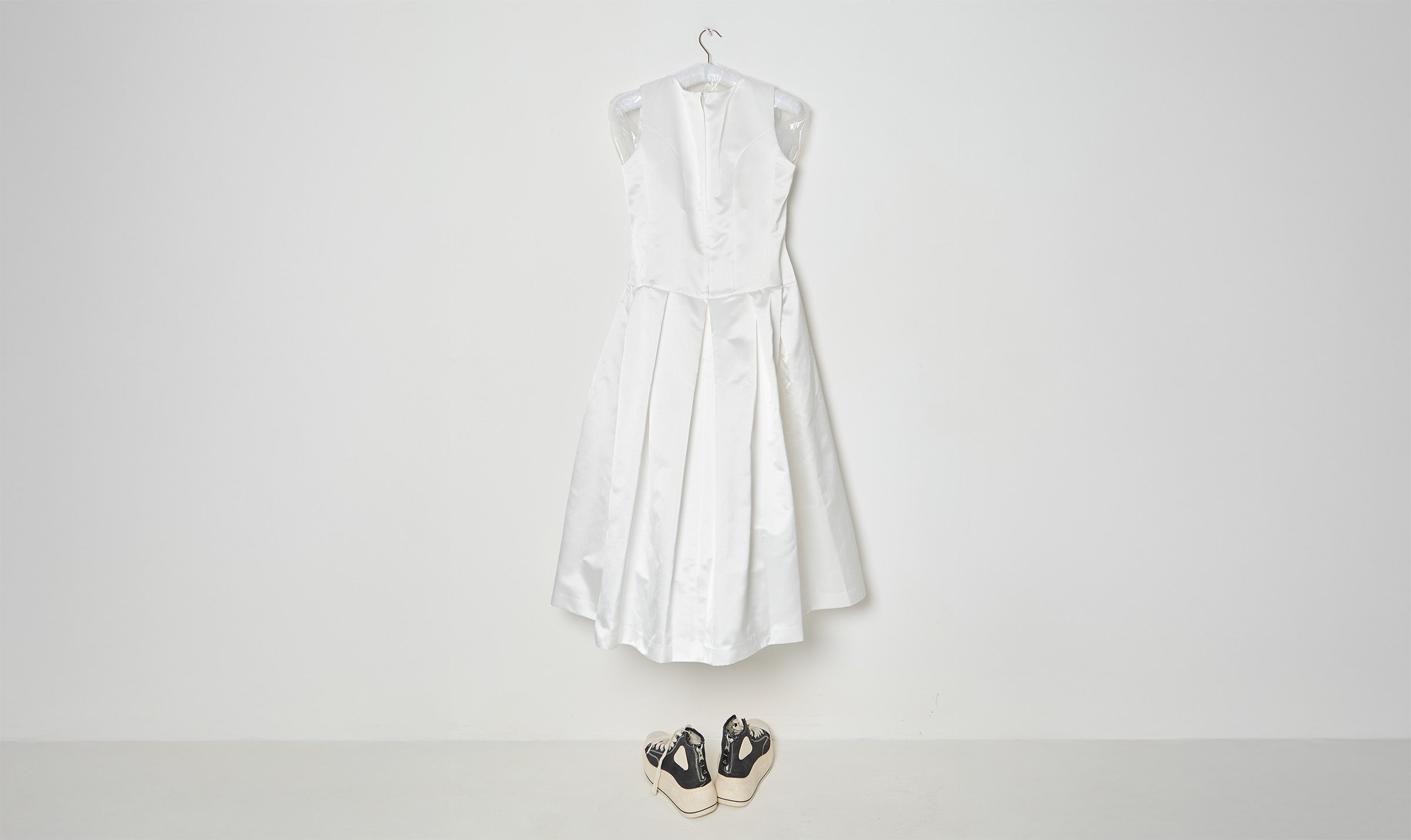 white draped flowers dress