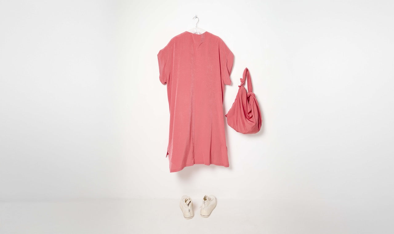 rolled up pink dress