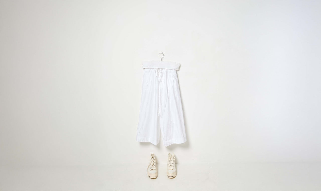 white cotton trousers