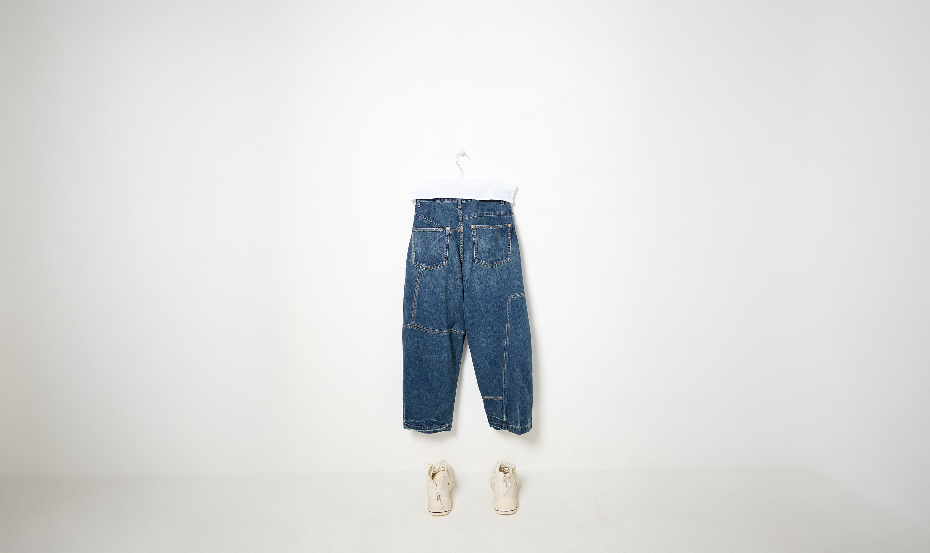 indigo blue cotton denim deconstructed trousers