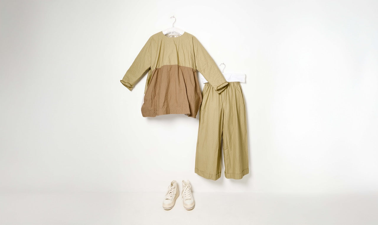khaki cotton trousers and blouse look