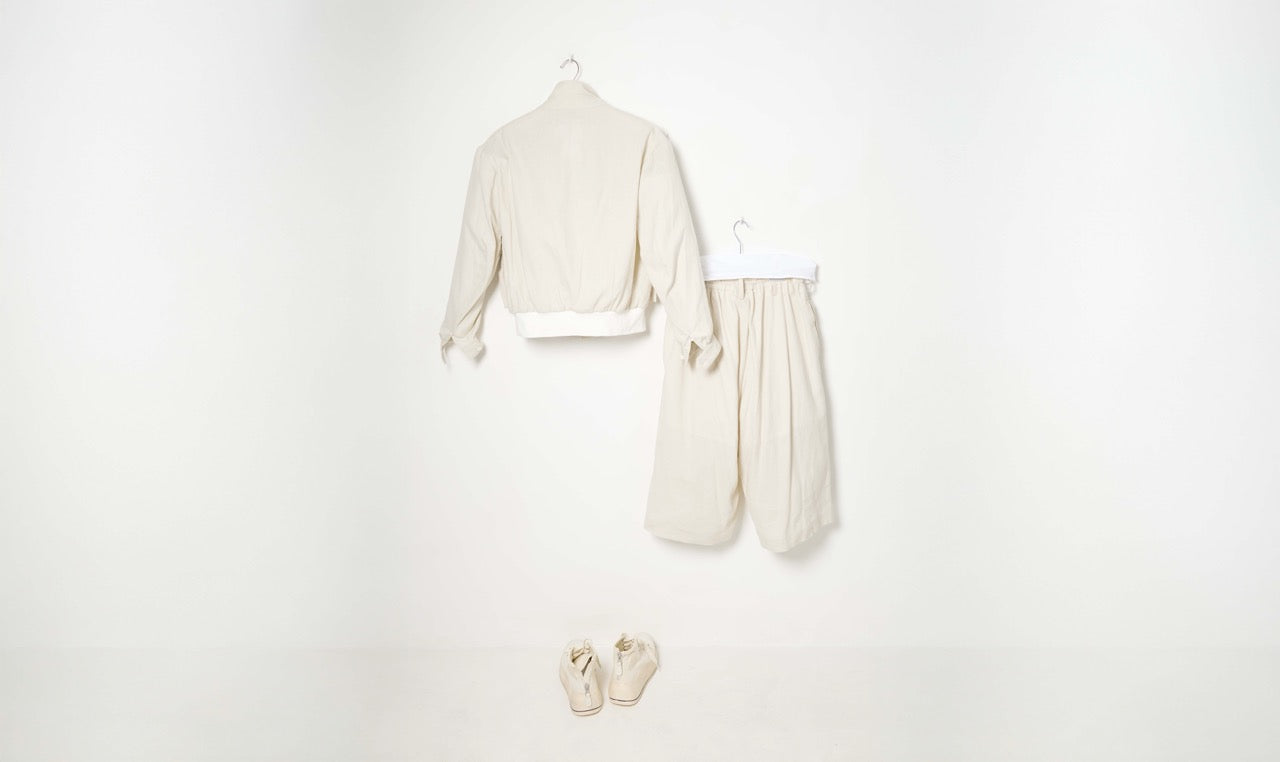 white ivory cotton trousers and jacket look