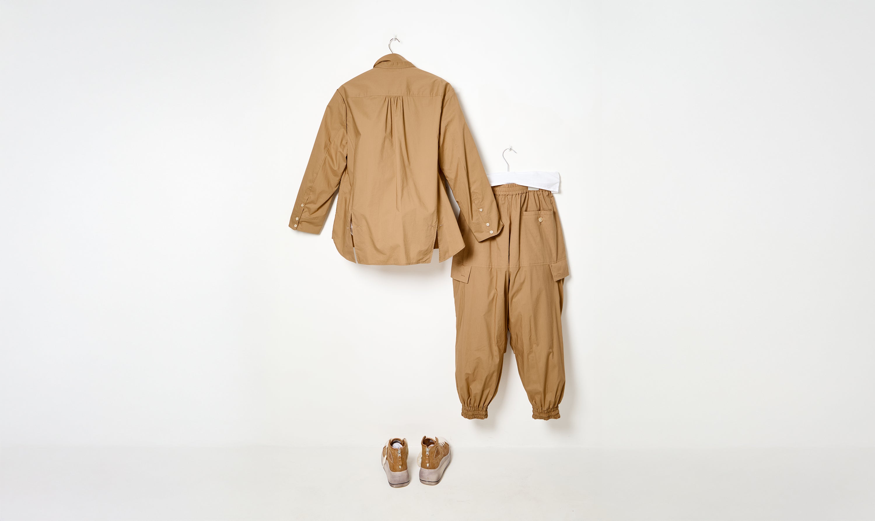 beige undercover trousers and jacket outfit