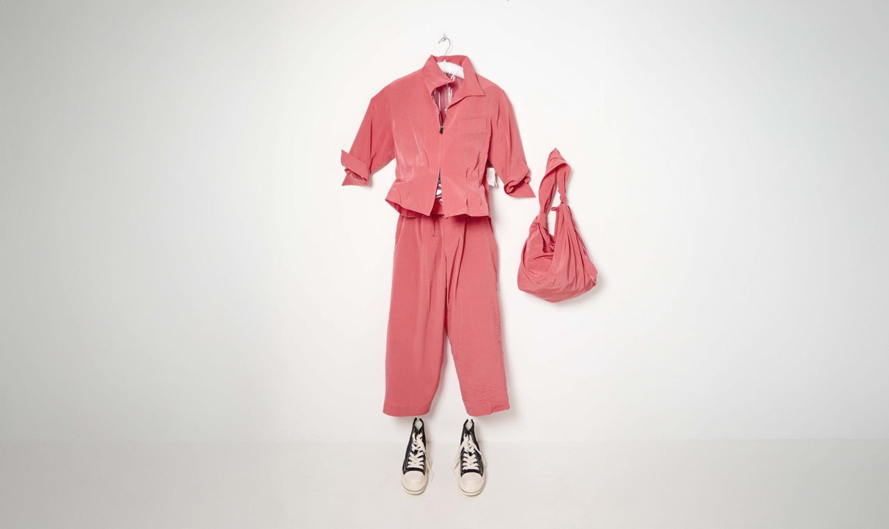 pink light technical jacket and straight pants look