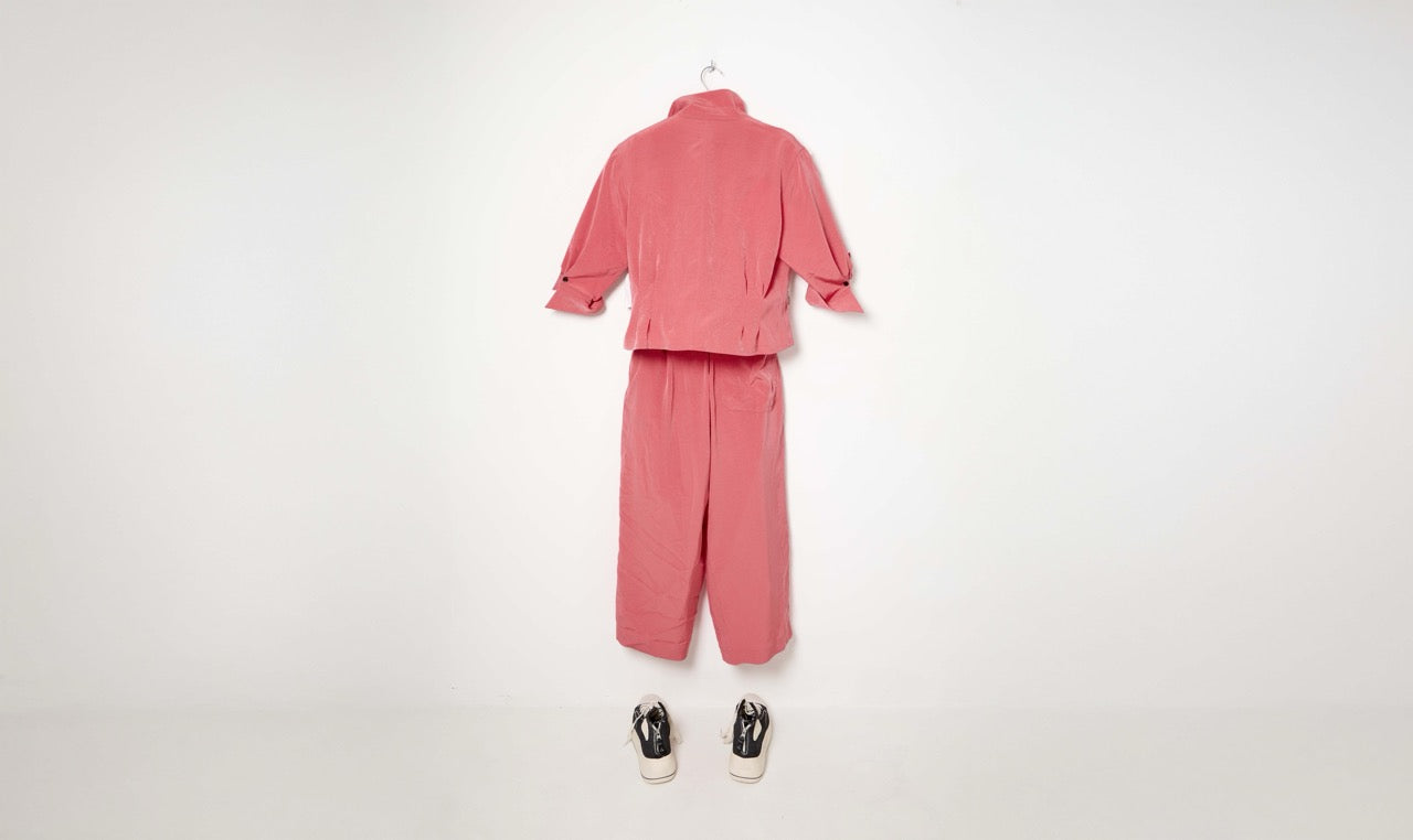 pink light technical jacket and straight pants look