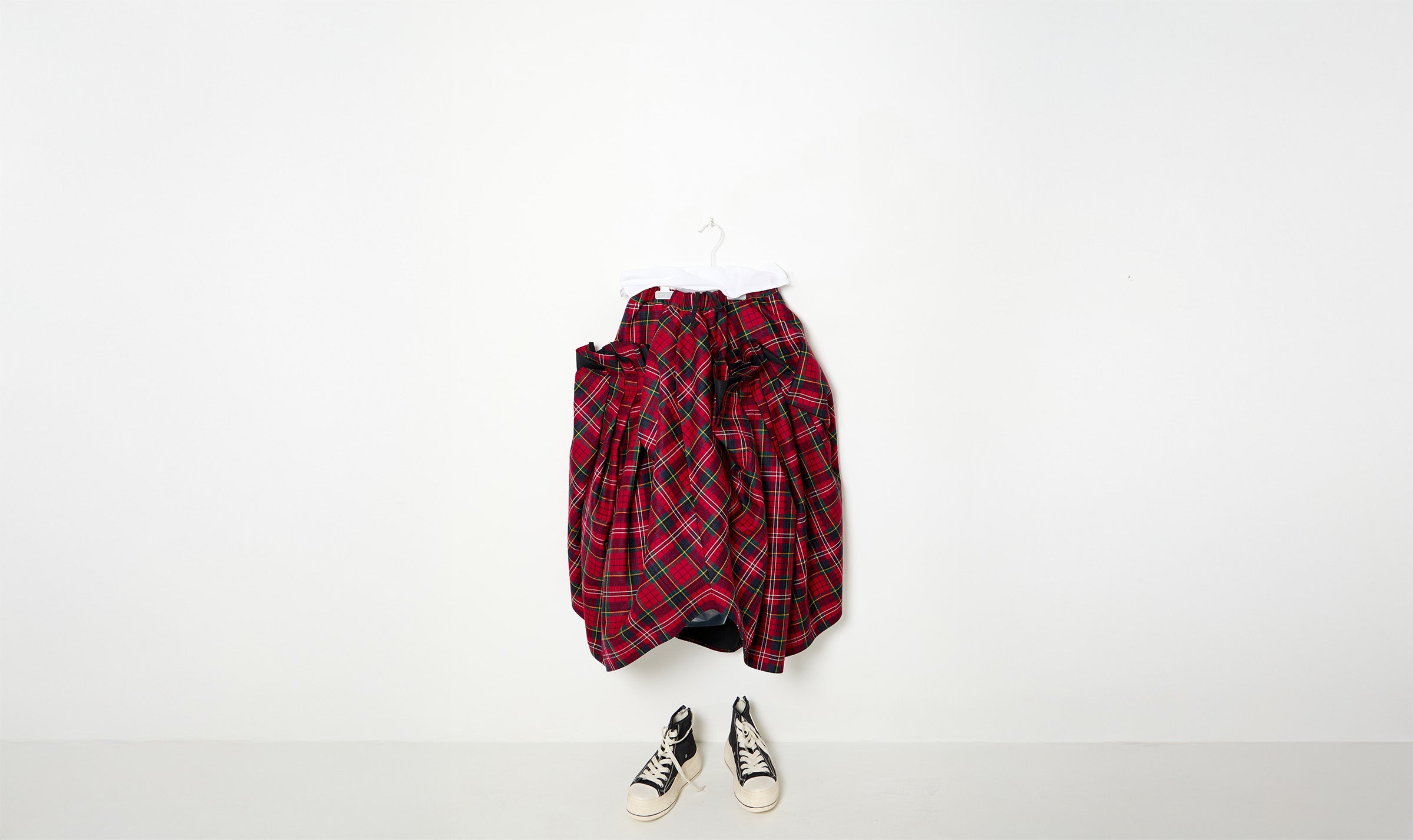 deconstructed red woolen tartan skirt