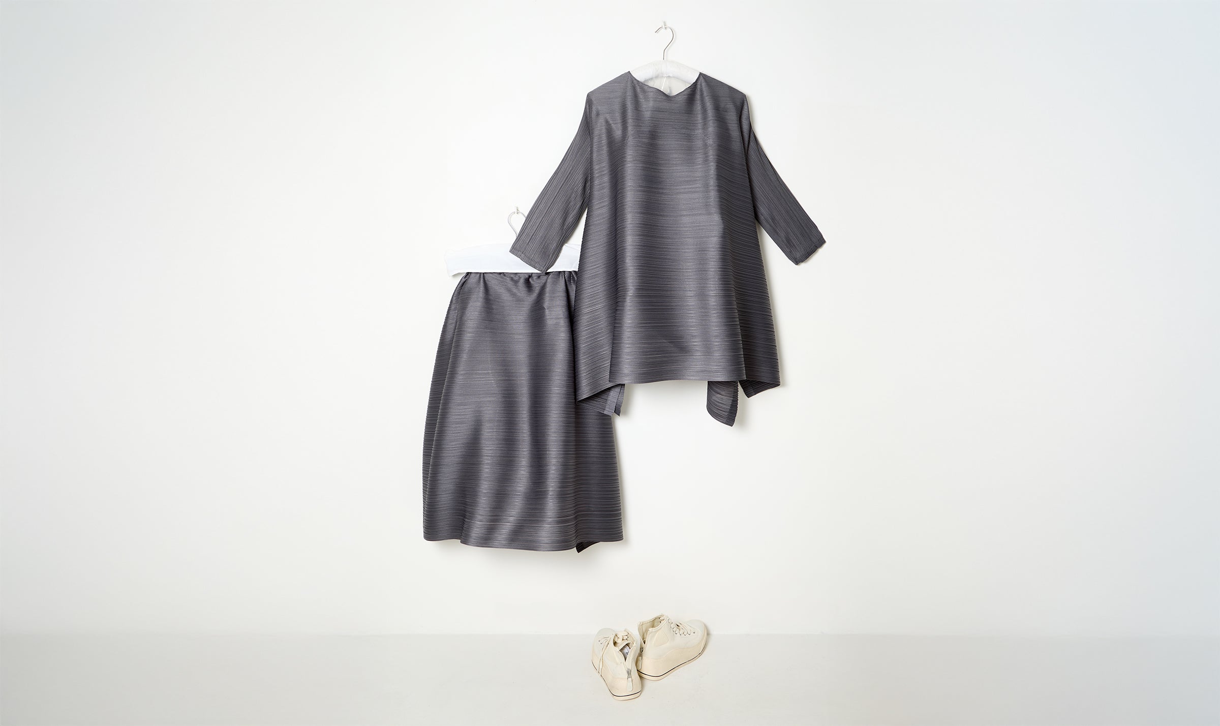 grey embroidered pleated blouse and skirt look