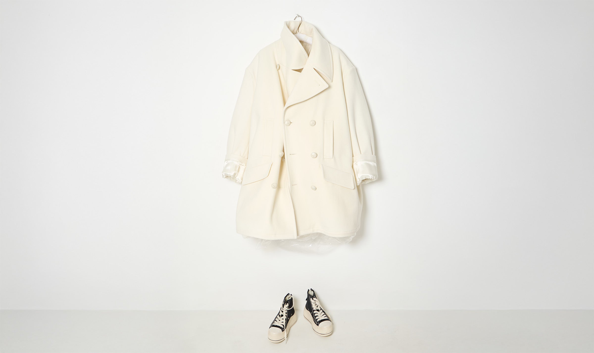 ivory woolen double-breasted coat