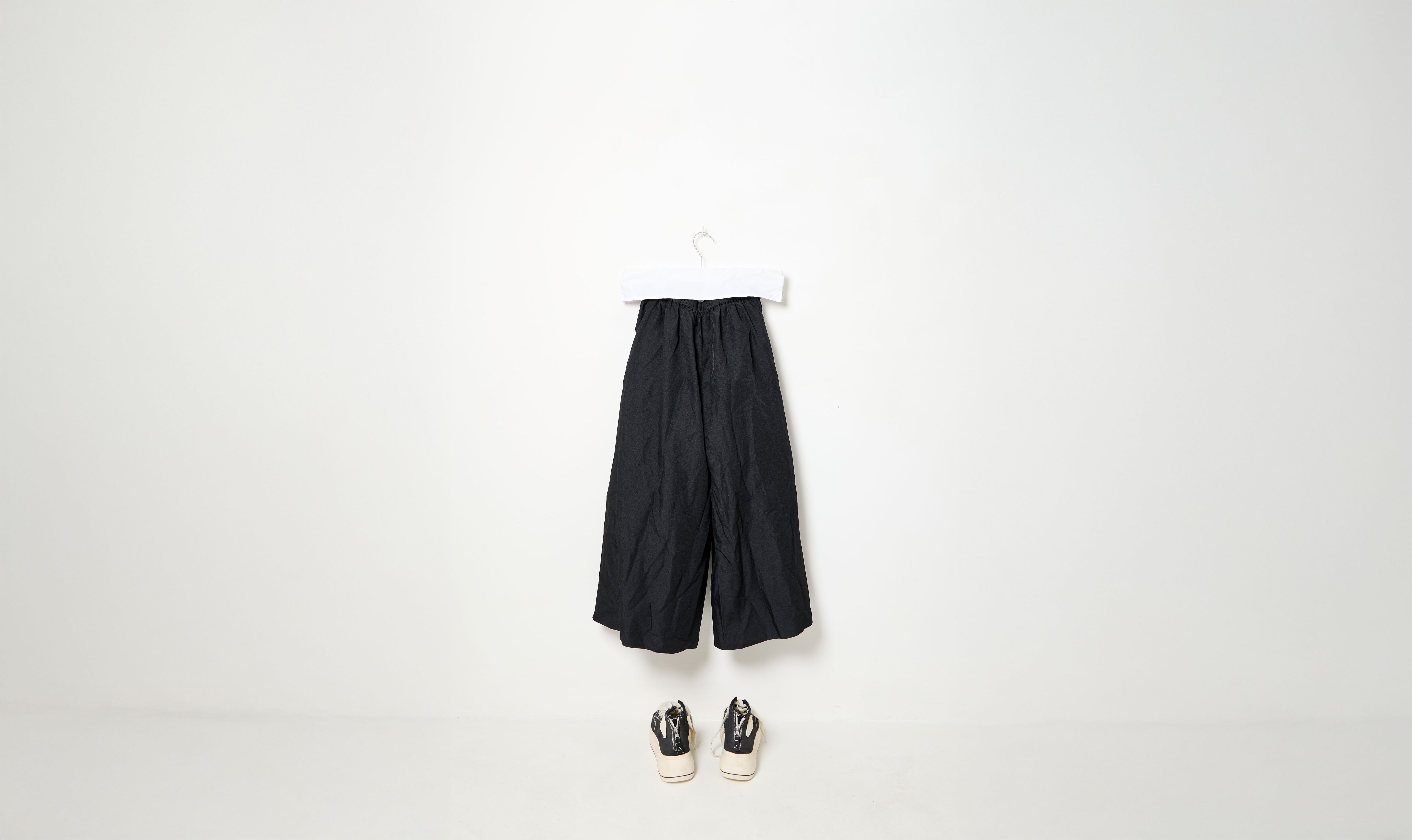 black flared trousers