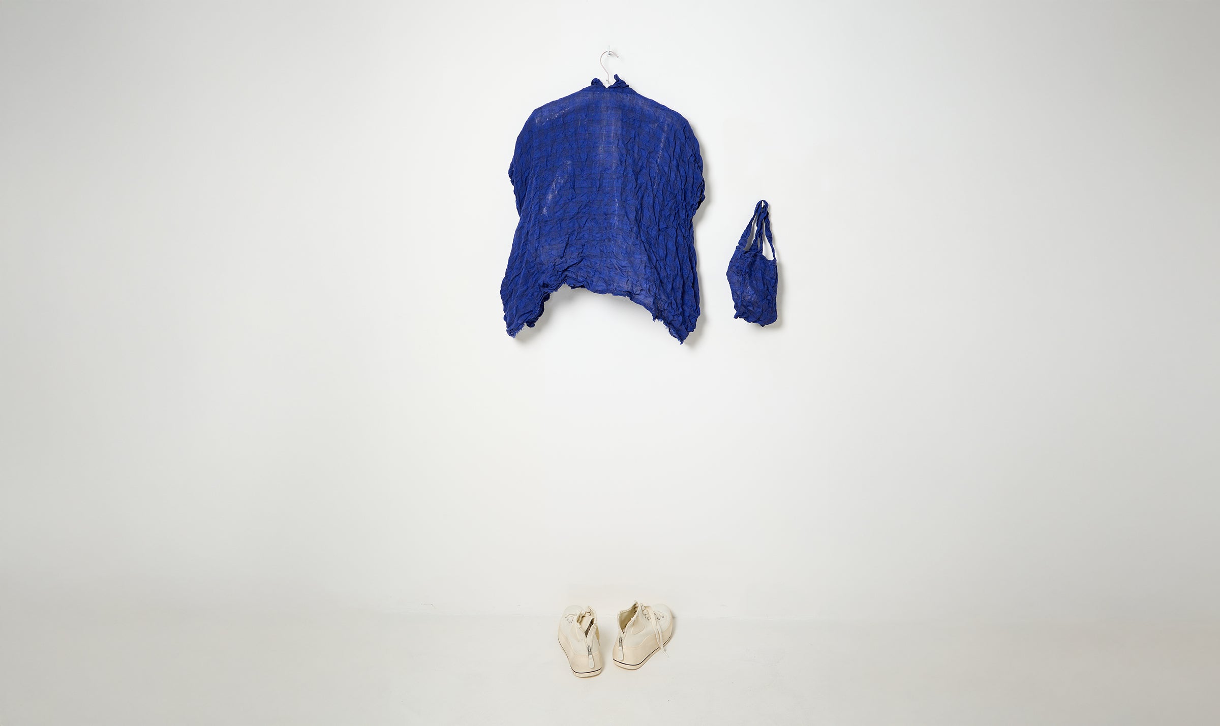 washed blue crinkled shirt