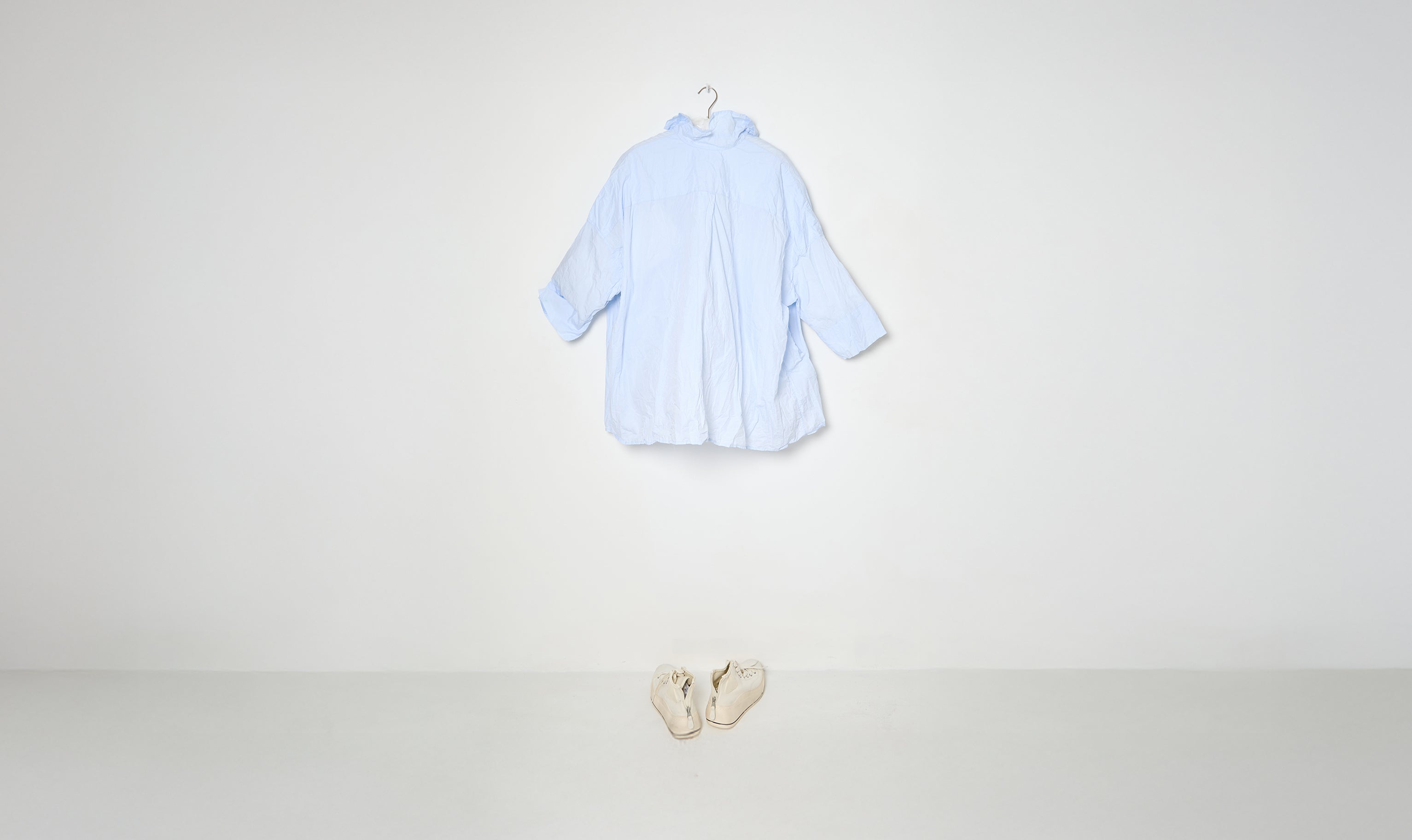 washed light blue shirt