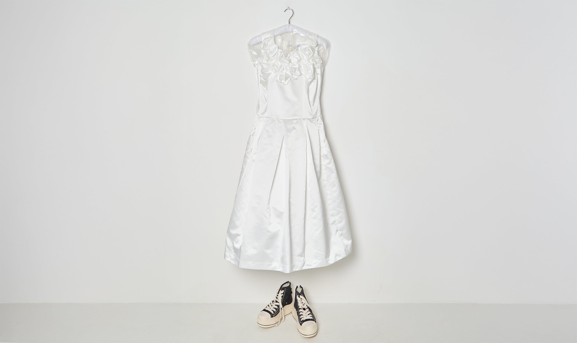 white draped flowers dress