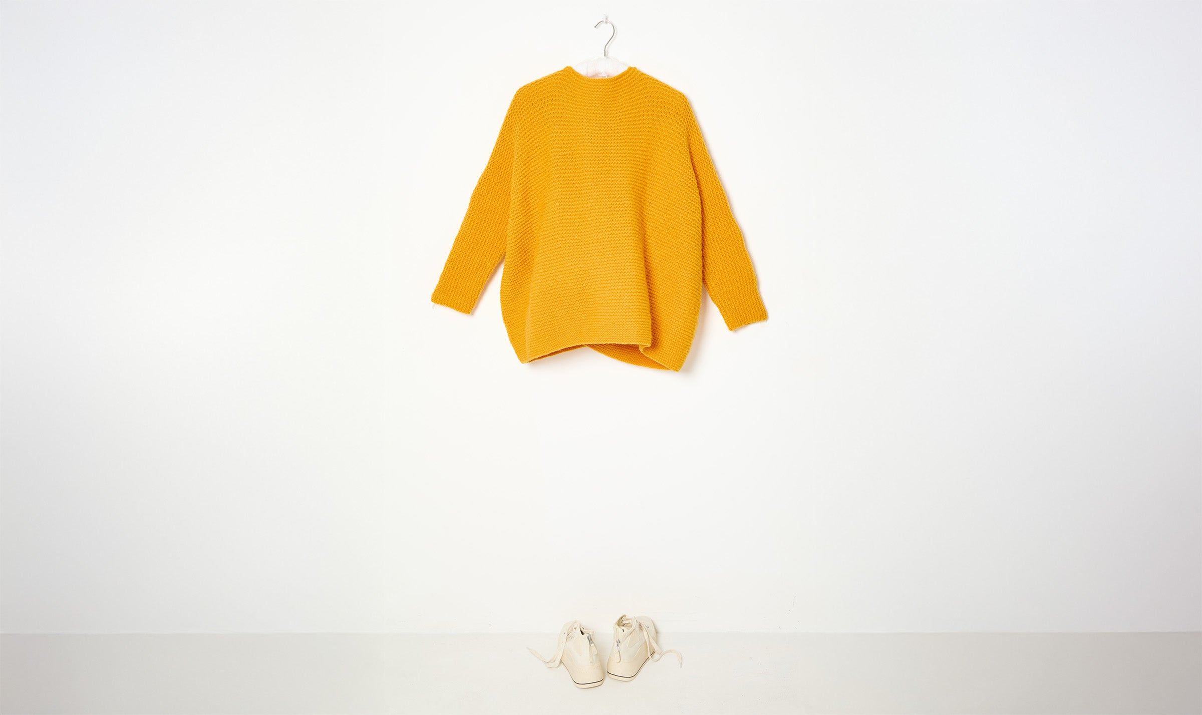 yellow woolen cardigan