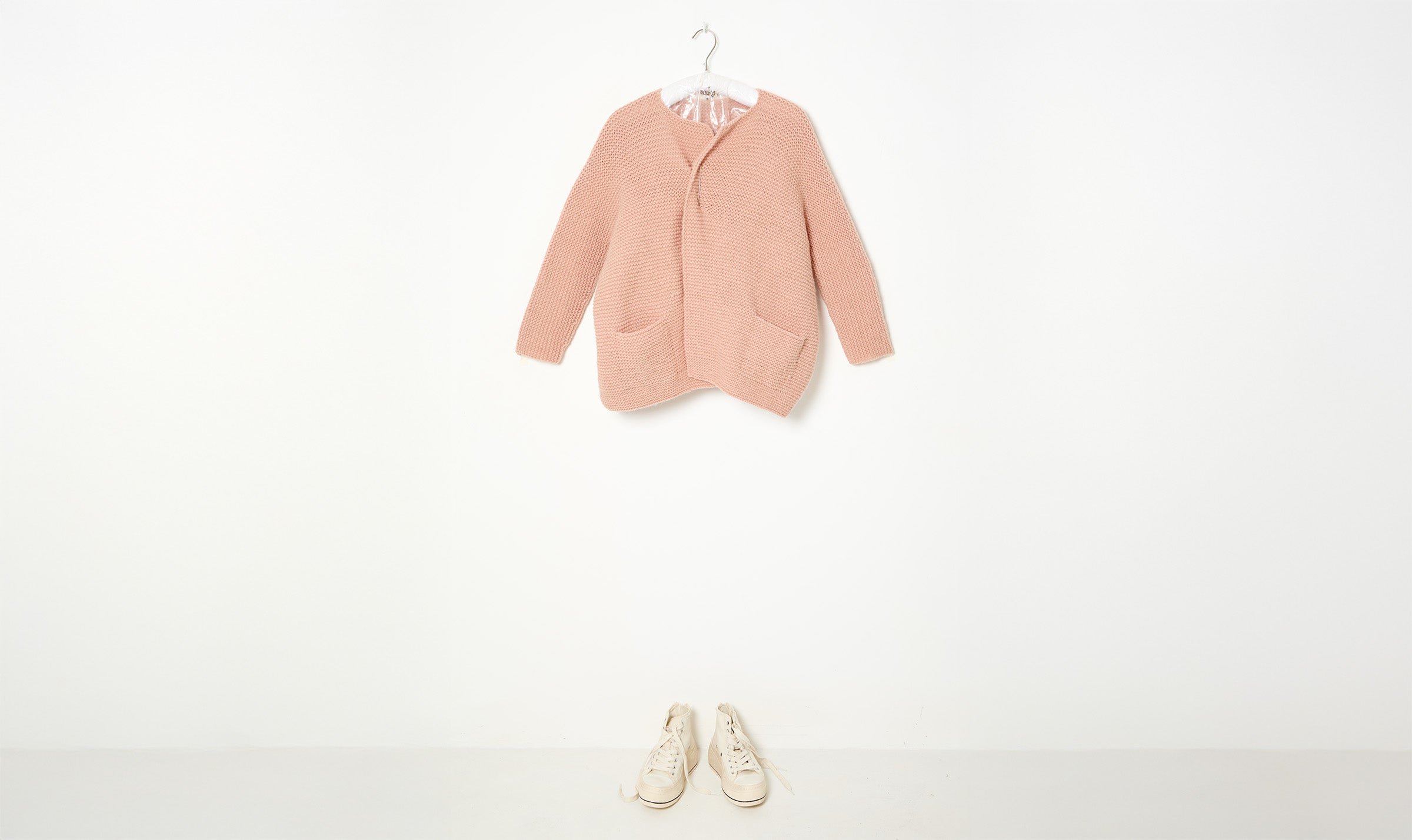 pink woolen cardigan