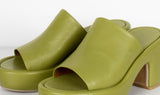 green leather slippers
