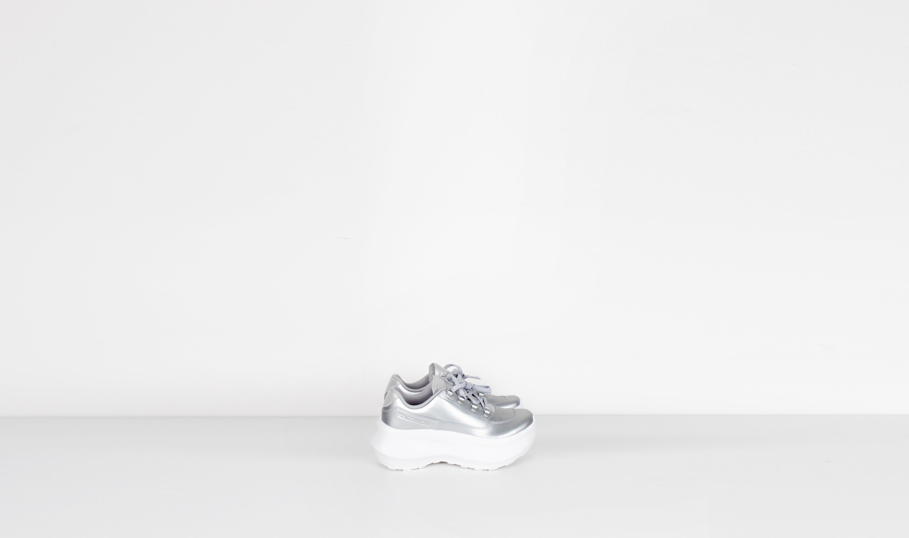silver leather salomon sneakers