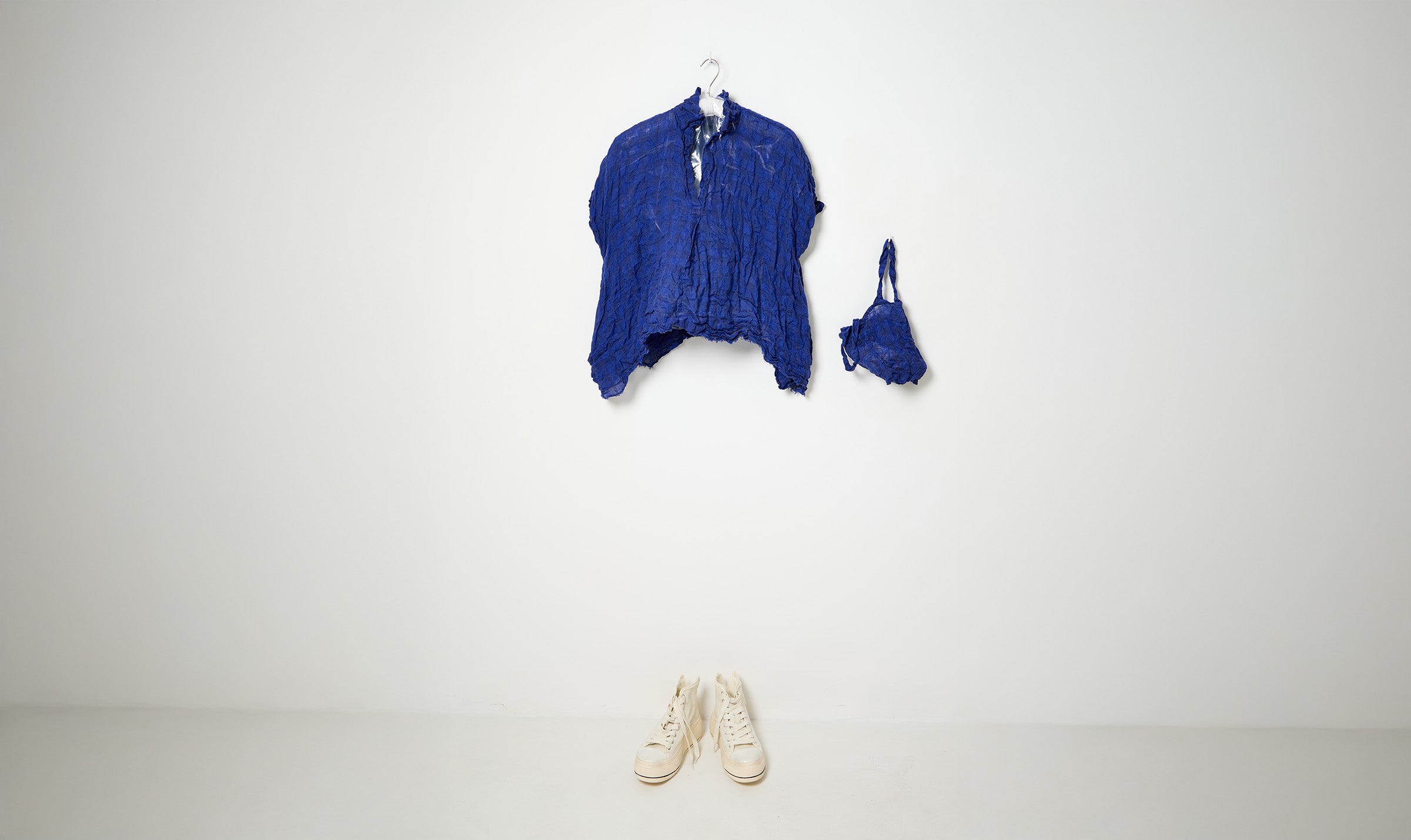 washed blue crinkled shirt