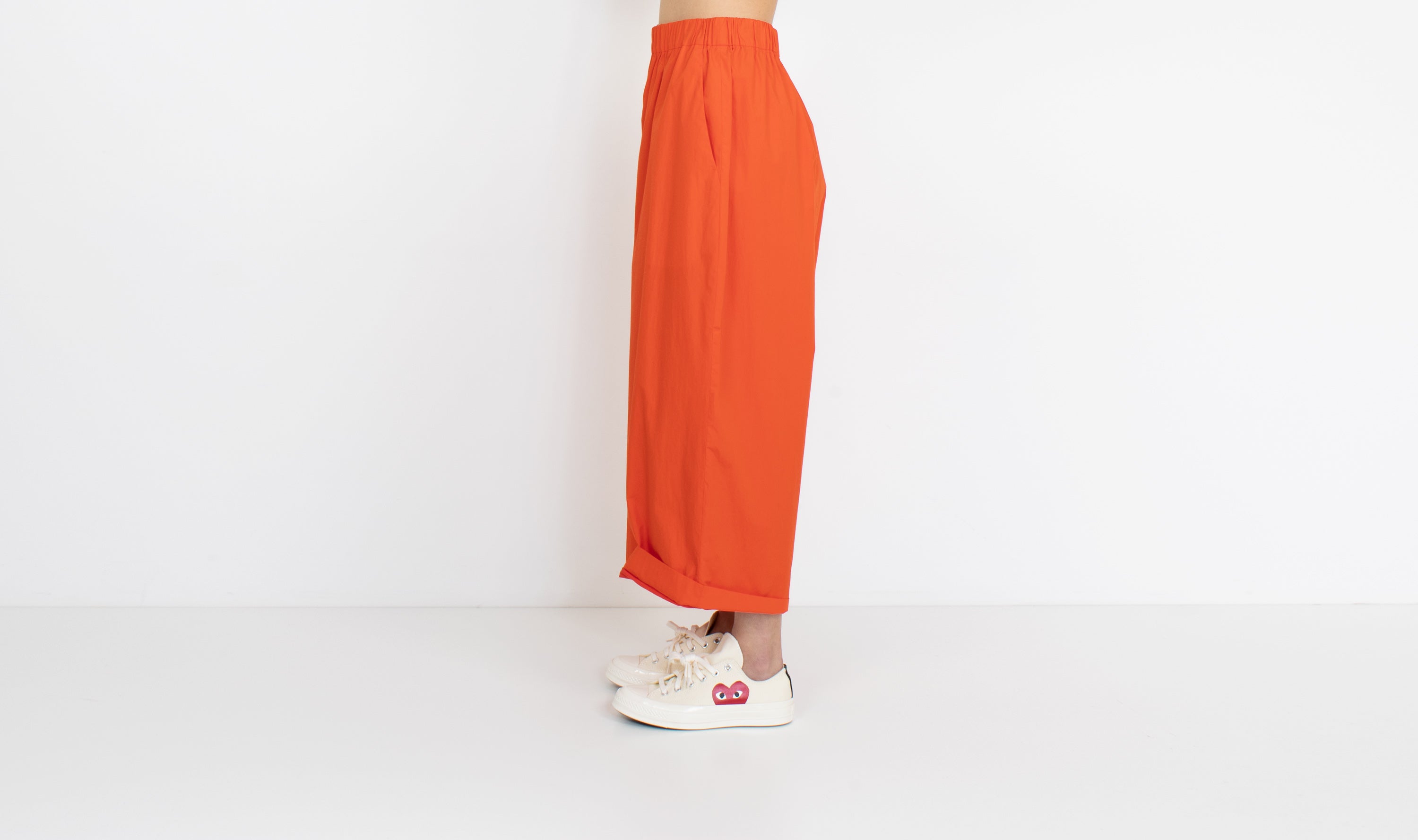 red orange cotton trousers