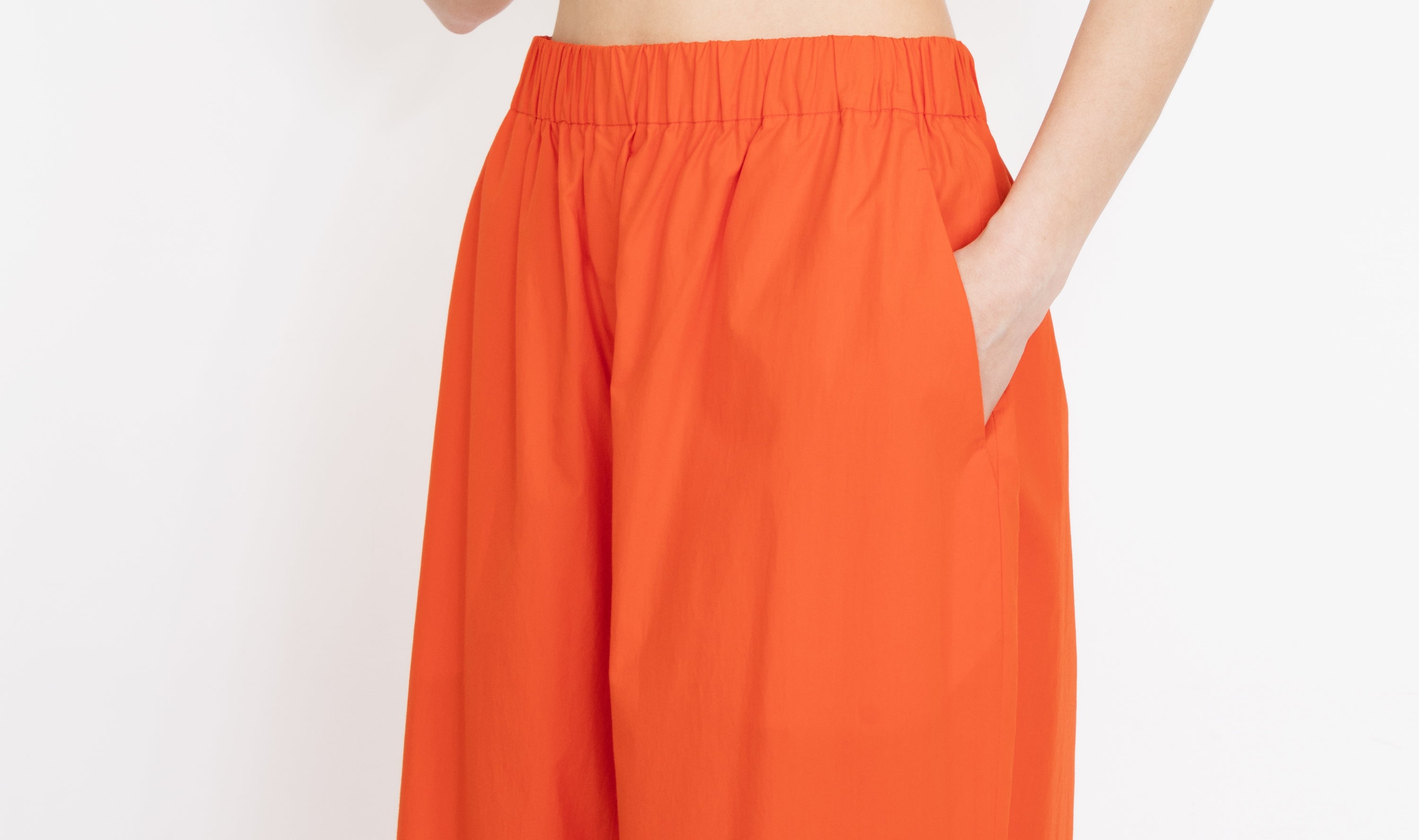 red orange cotton trousers