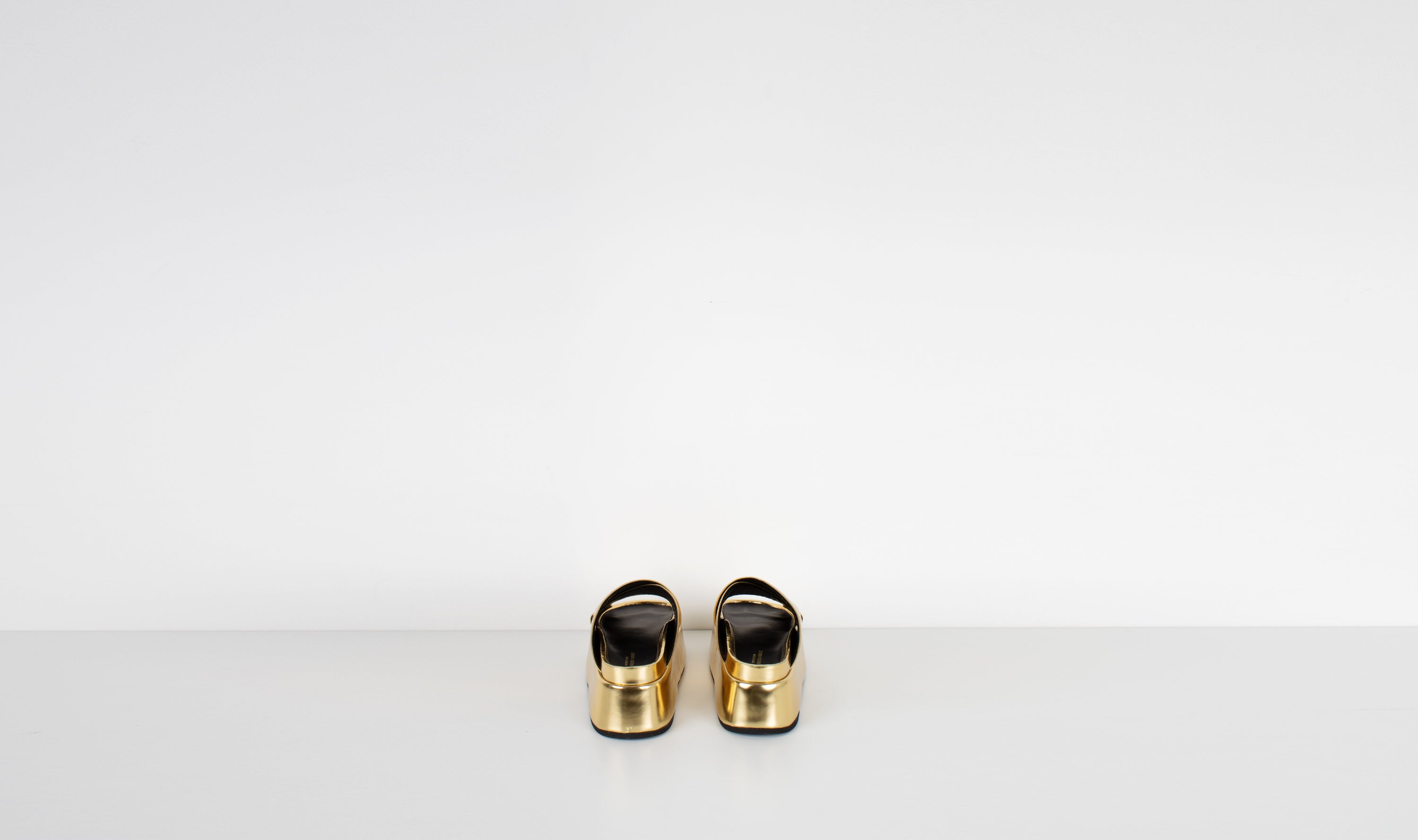 gold shiny leather slippersJUNYA WATANABE