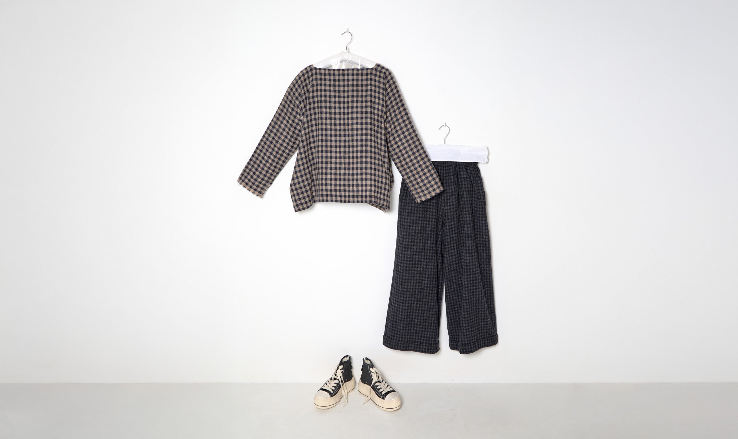 check trousers and blouse outfit