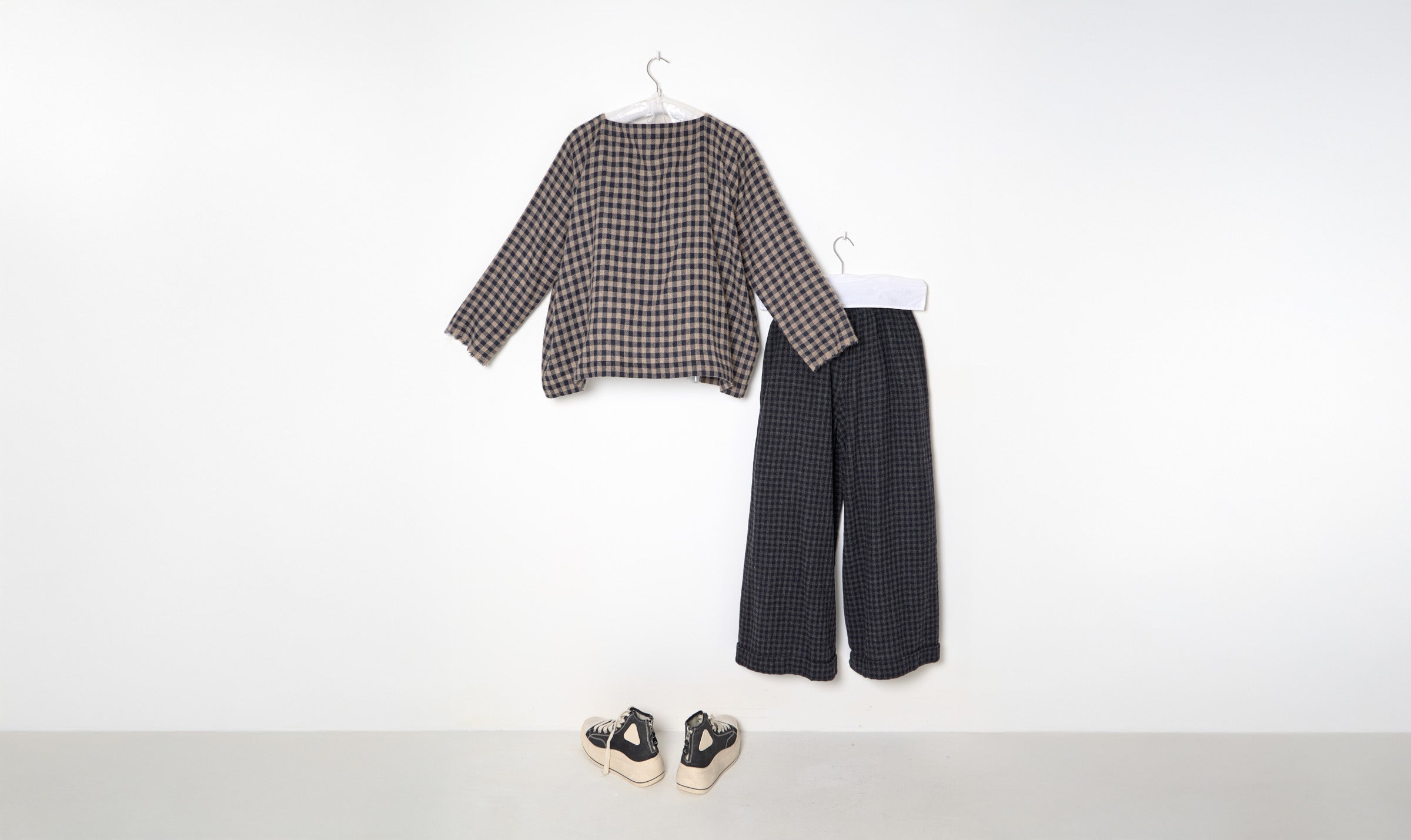 check trousers and blouse outfit