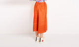 orange plissé trousers