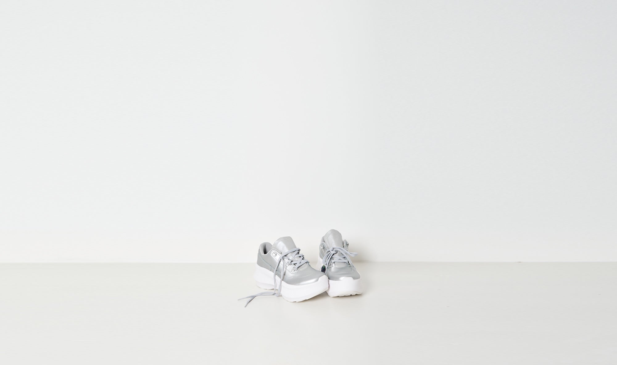 silver leather salomon sneakers