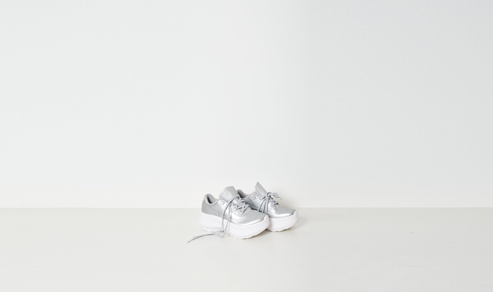 silver leather salomon sneakers